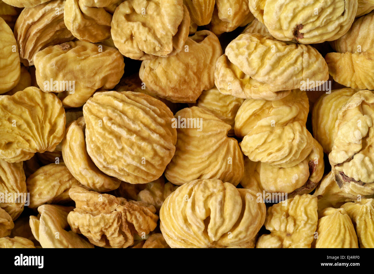 Dried chestnuts background close-up Stock Photo