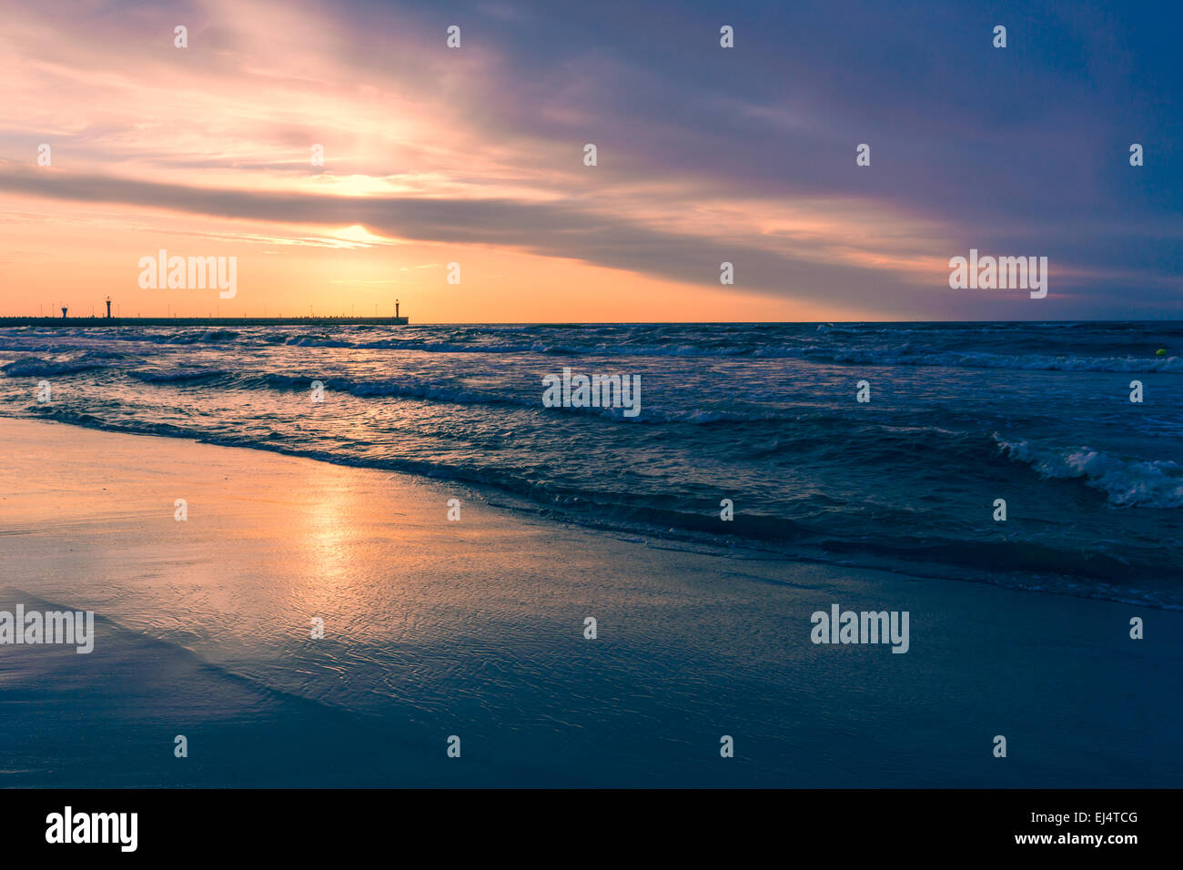 sunset on the beach Stock Photo - Alamy