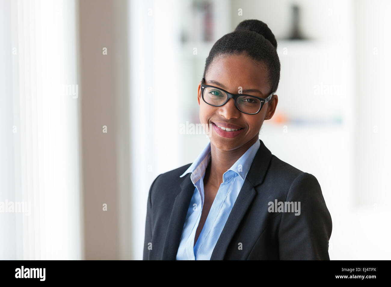 Portrait of a young African American business woman - Black people ...