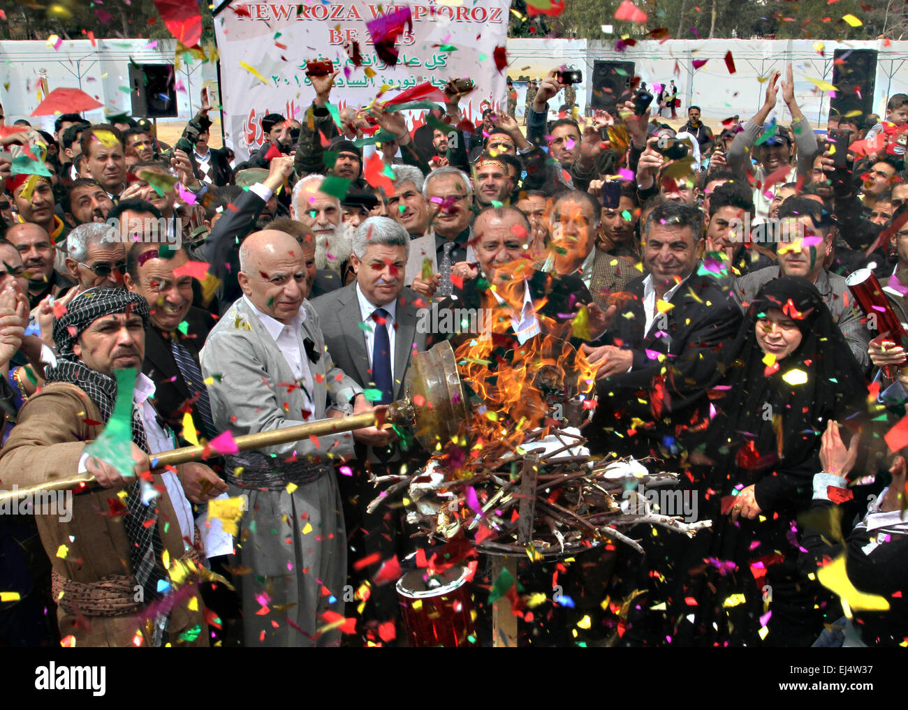 Damascus, Syria. 21st Mar, 2015. Syrian Kurds set fire as they gather