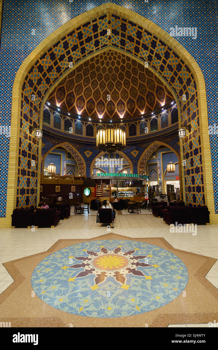 Starbucks coffee shop in ornate atrium at Ibn Battuta shopping mall in Dubai United Arab Emirates Stock Photo