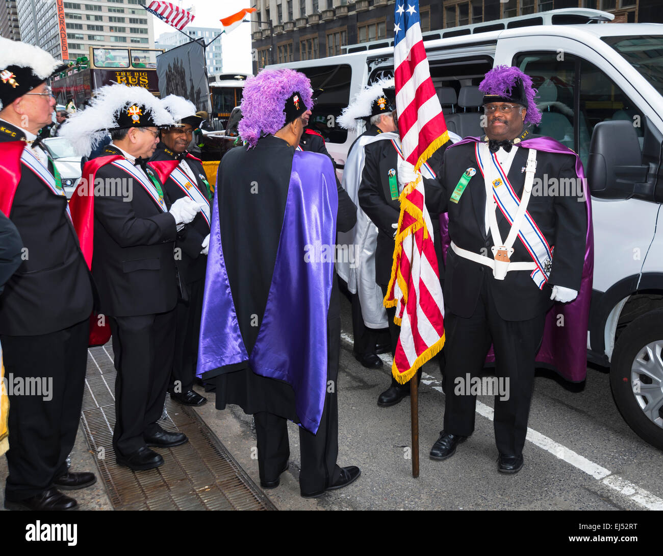 Honored guests in formal attire with American flag, St. Patrick's Day Parade; Philadelphia Stock Photo