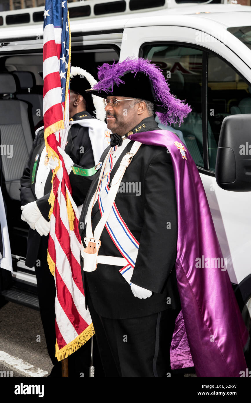 African American, honored guests in formal attire with American flag,  St. Patrick's Day Parade, Philadelphia, USA Stock Photo