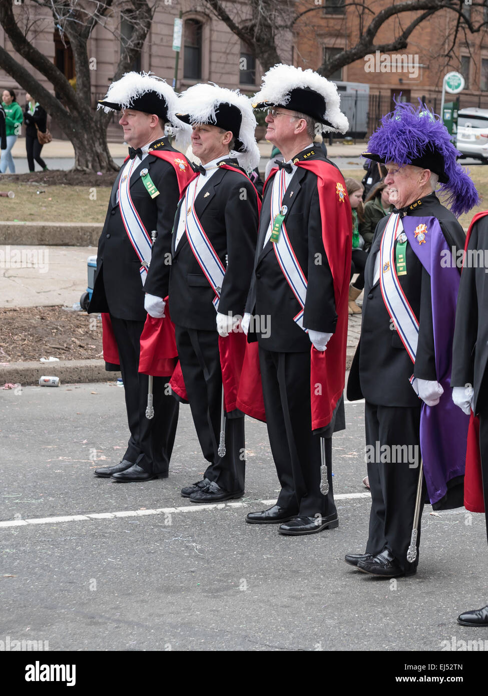 Four Honored guests in formal attire, St. Patrick's Day Parade, Philadelphia, USA Stock Photo