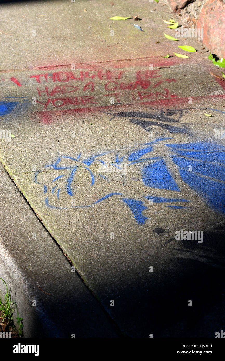 A graffiti criticizing gun control and police killings in San Francisco, USA. Stock Photo