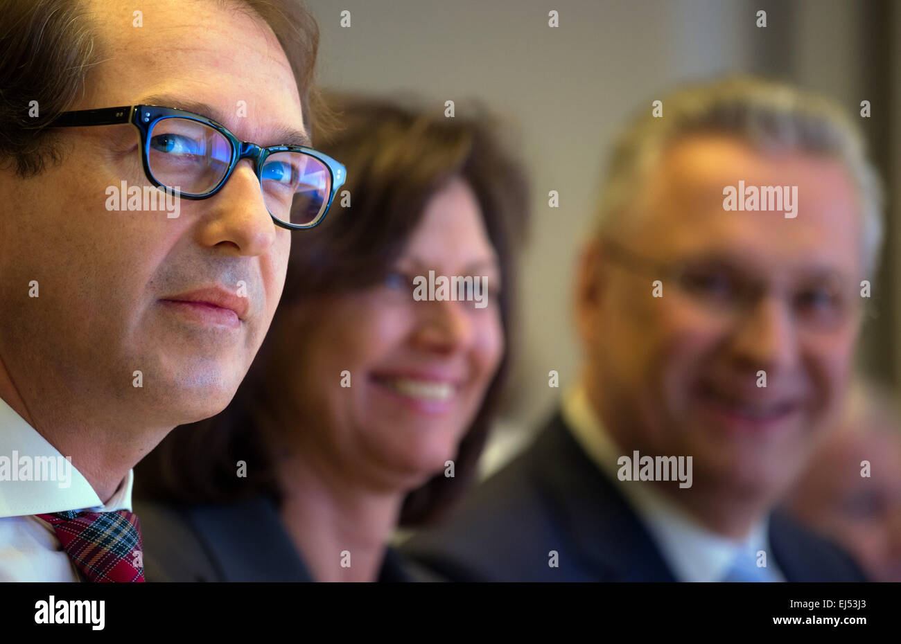Bamberg, Germany. 21st Mar, 2015. German Federal Minister for Transport and Digital Infrastructure Alexander Dobrindt (all CSU, l-r), Bavarian Minister of State for the economy and media, energy and technology Ilse Aigner and the Bavarian interior minister Joachim Herrmann pictured at the small party conference in Bamberg, Germany, 21 March 2015. Photo: Nicolas Armer/dpa/Alamy Live News Stock Photo