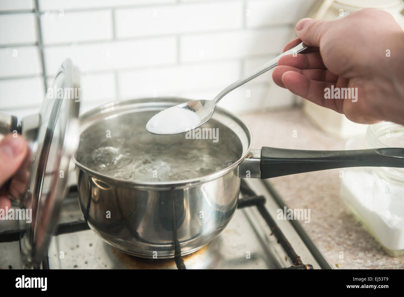 salted boiling water, cook cooking dinner Stock Photo Alamy