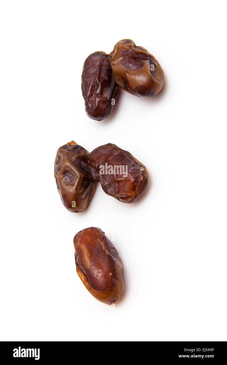 Halawi dates isolated on a white background.  Halawi dates originate from date trees in the deserts and farms of Iraq. Stock Photo