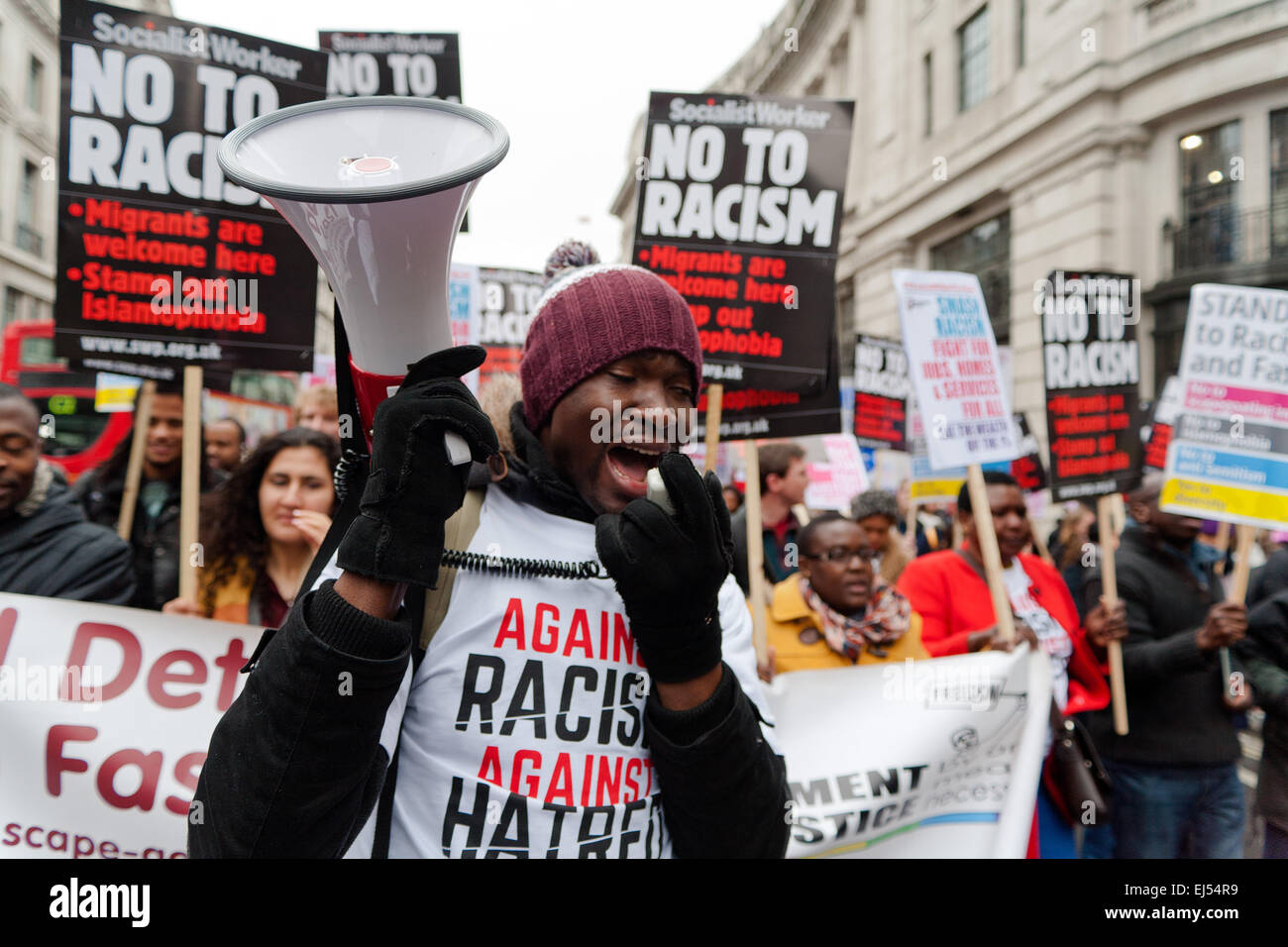 London, UK. 21st March, 2015. Protesters waliking with placard at the Stand up to racism and fascism Protest London,  Credit:  Peter Barbe/Alamy Live News Stock Photo