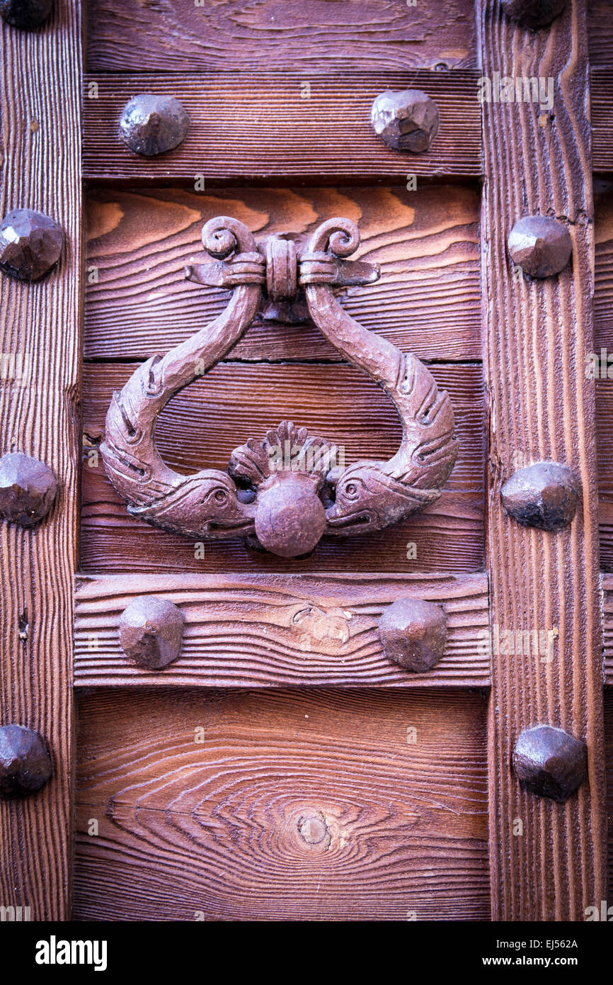 Medieval Exit Button ancient door knocker of a medieval wooden portal Stock Photo - Alamy