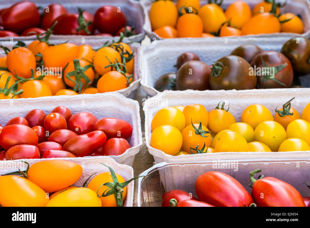 small tomatoes on display at the farmers market Stock Photo - Alamy