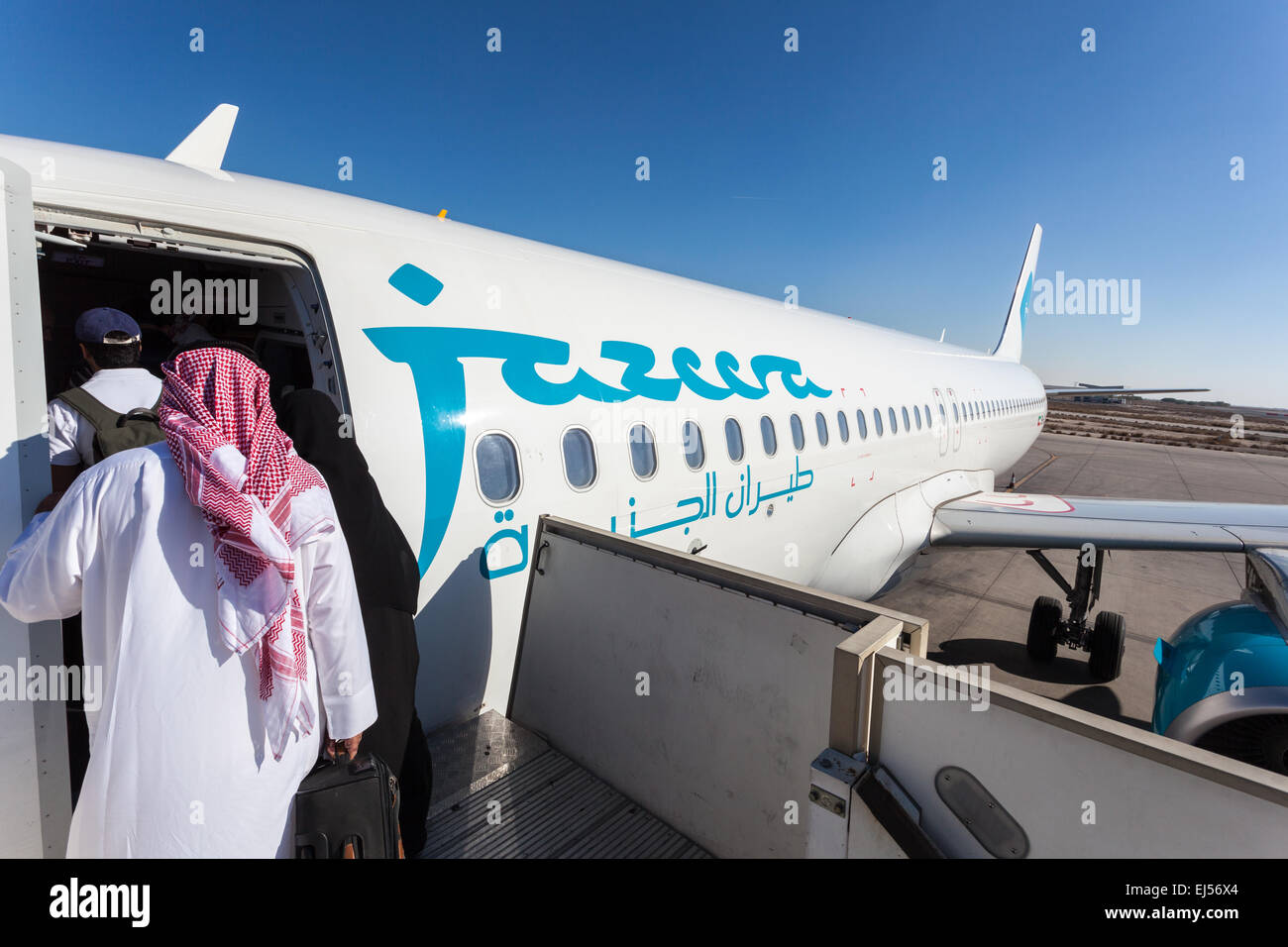 Jazeera Airways airplane boarding at the Kuwait International Airport Stock Photo