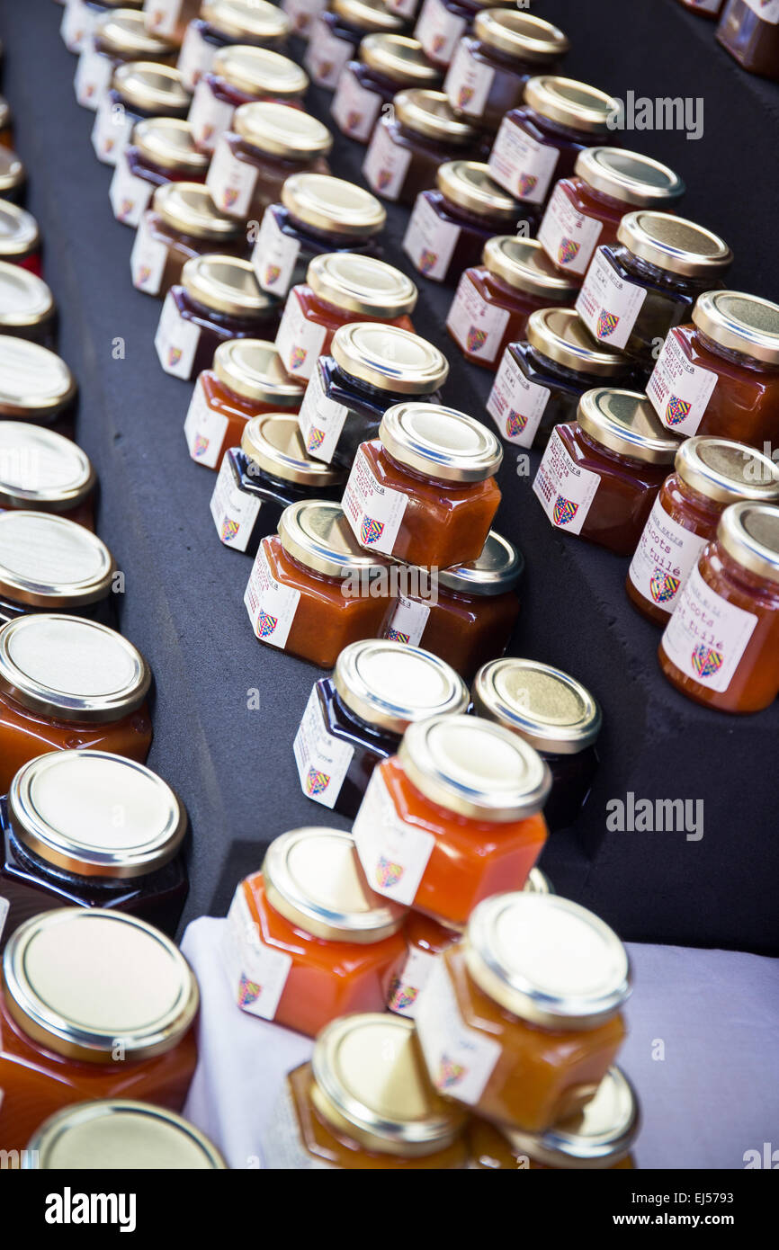 Jars of jam and marmalade on sale at a farmers market in Beaune