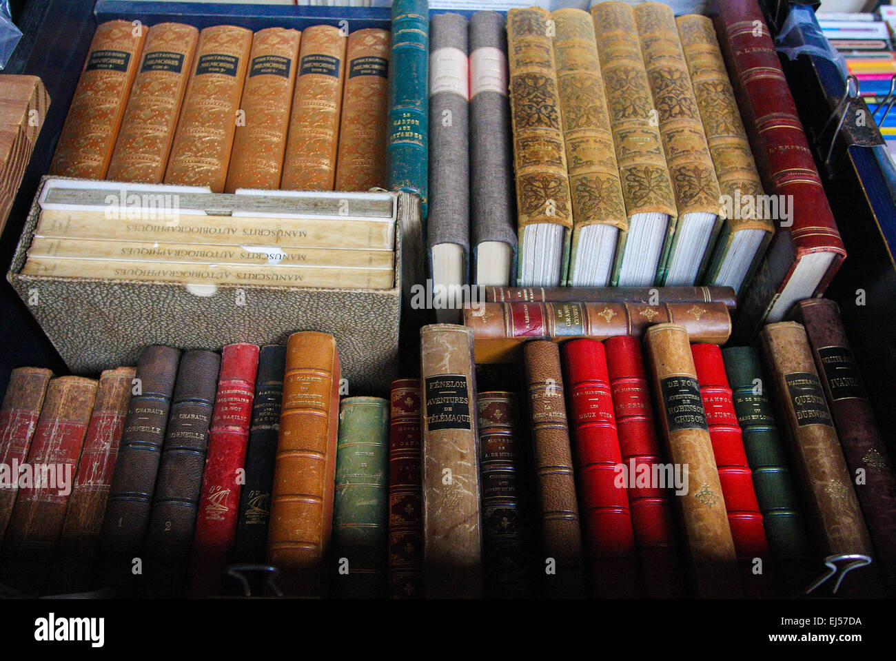 Old books on display at an antique book market in Lille, France. Stock Photo
