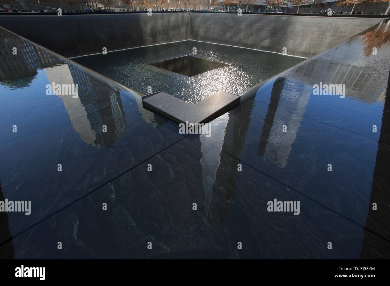 One World Trade Center (1WTC), Freedom Tower reflections and Footprint of WTC, National September 11 Memorial, New York City, New York, USA Stock Photo