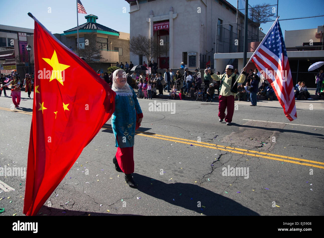 Chinese and U.S. flags at Chinese New Year parade, 2014, Year of the Horse, Los Angeles, California, USA Stock Photo