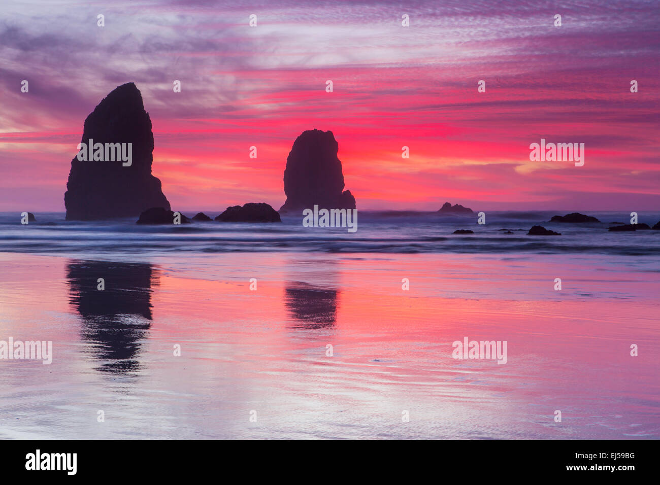 Sunset over sea stacks at Cannon Beach, Oregon, USA. Stock Photo