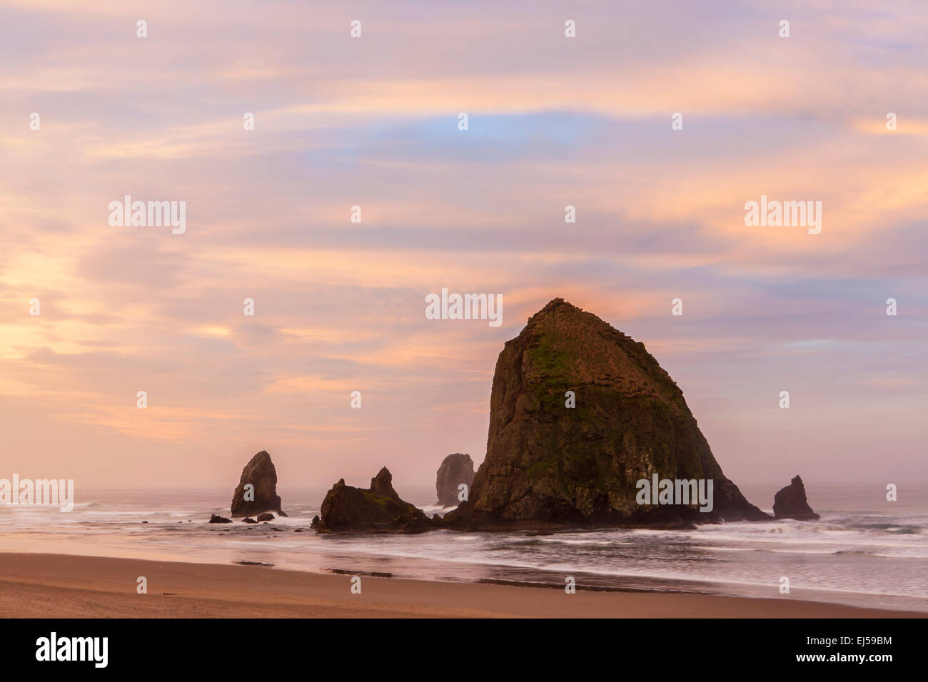 Haystack Rock at Cannon Beach in the morning hours, Oregon coast, Oregon, USA. Stock Photo