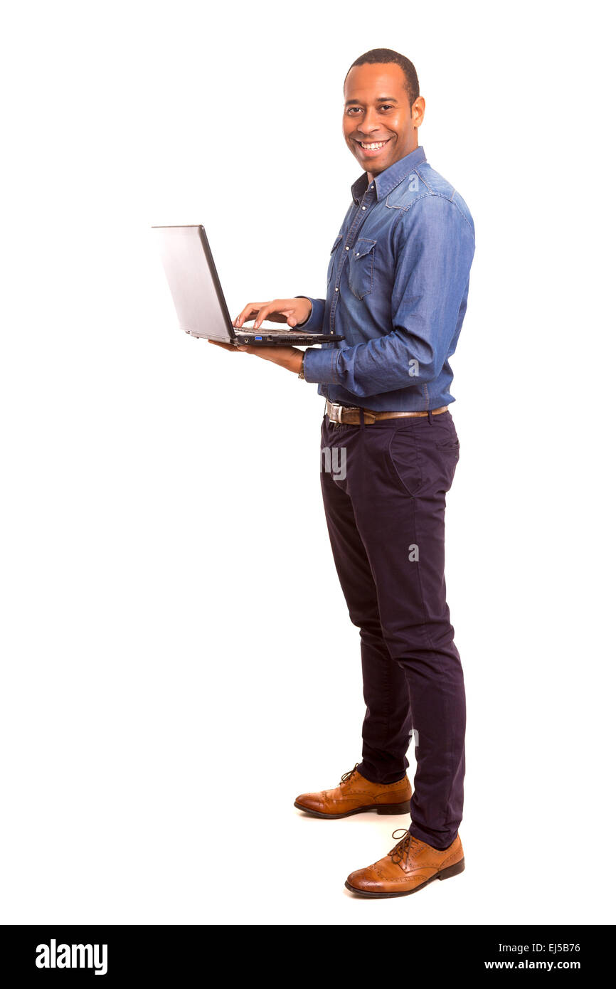 A young african business man working with a laptop Stock Photo