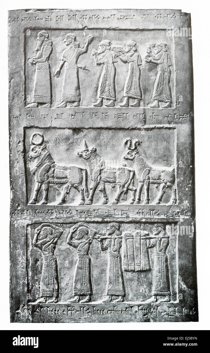 These details are from the black limestone obelisk of Shalmaneser III and dates to 854-824 B.C. It was found in 1846 by Henry Layard who was excavating the ancient Assyrian capital of Kalhu (Nimrud). These scenes from the second side of the obelisk and show, from top to bottom: (1) tribute bearers of Jebu, King of Israel, (2) tributary animals, (3) tribute bearers with shawls and bags. The obelisk is now housed in the British Museum. Stock Photo