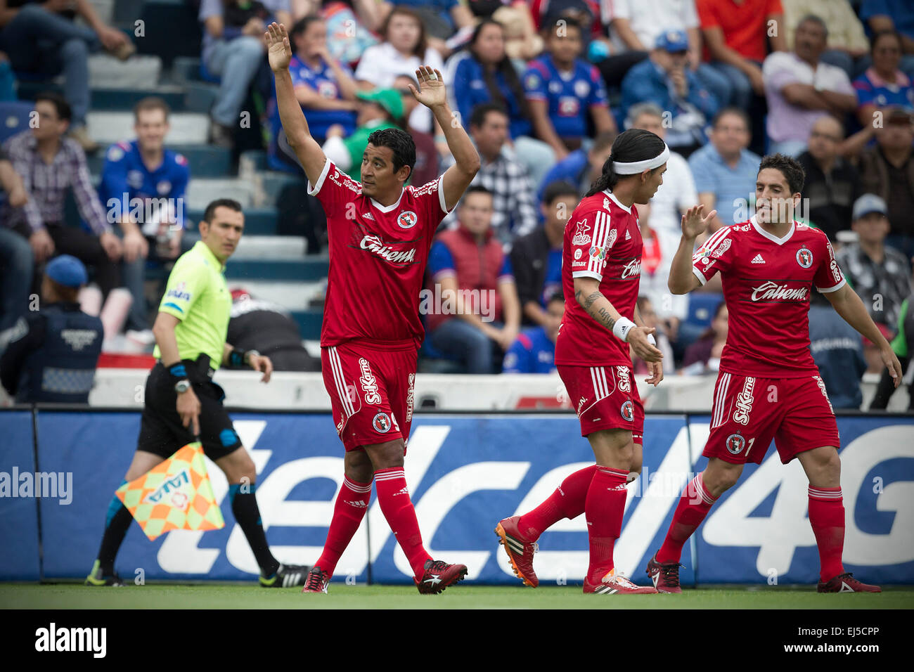 Mexico City, Mexico. 21st Mar, 2015. Alfredo Moreno (L) of Xolos celebrates his scoring during the match of 2015 Closing Tournament of MX League against Cruz Azul, in the Azul Stadium, in Mexico City, capital of Mexico, on March 21, 2015. © Alejandro Ayala/Xinhua/Alamy Live News Stock Photo