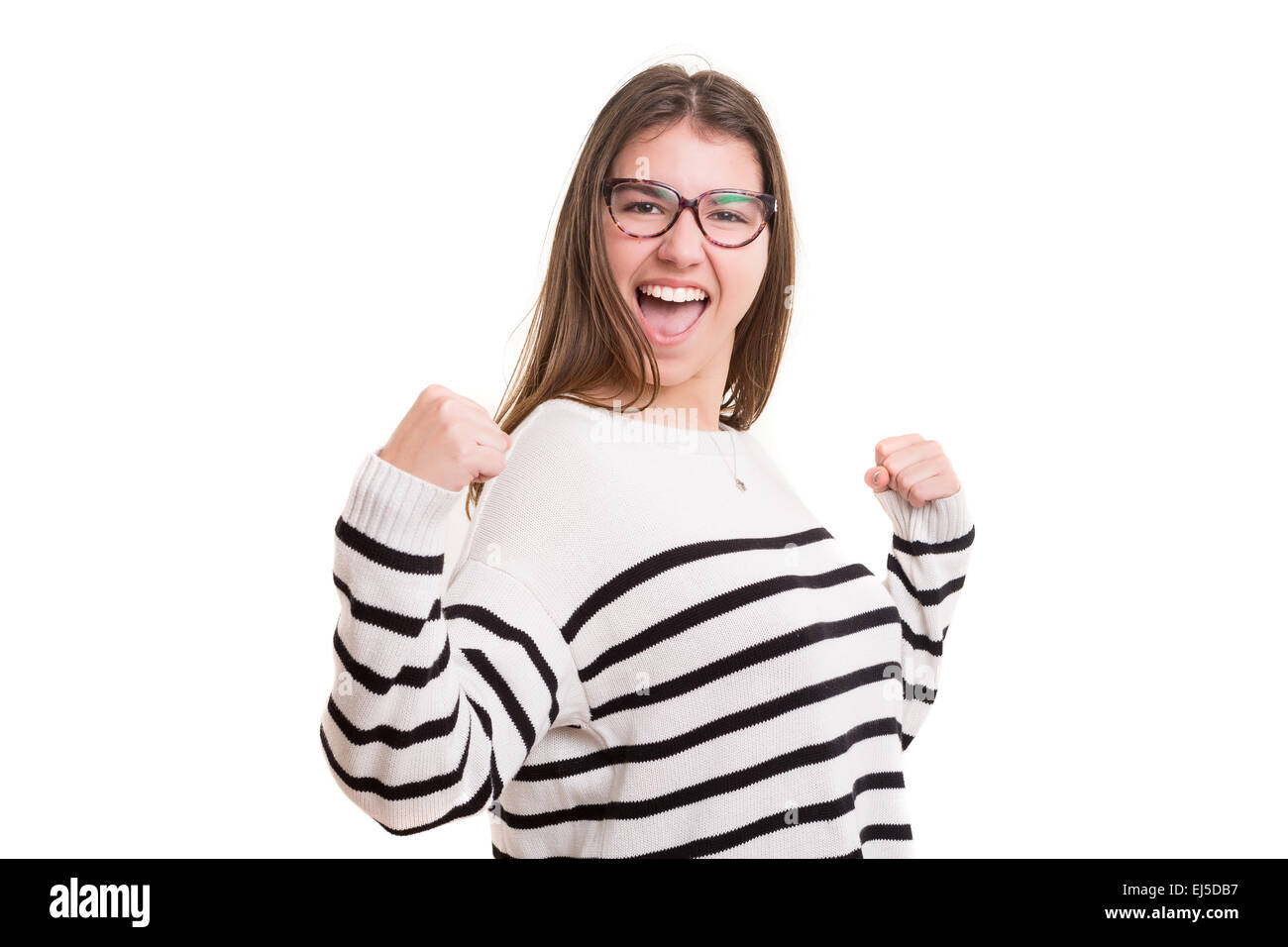 Studio shot: Happy woman with raised arms Stock Photo - Alamy