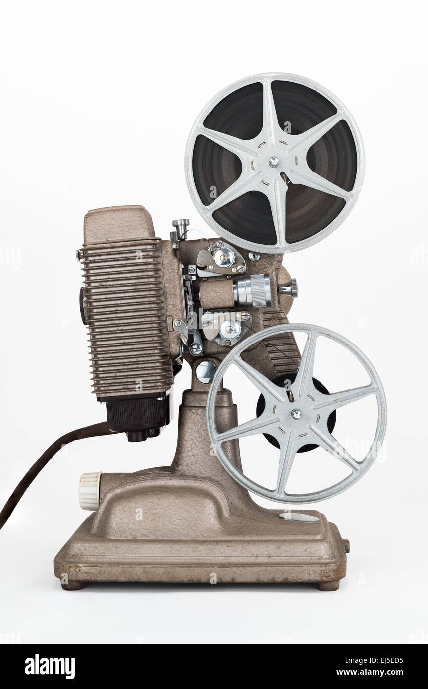 Side view of Vintage 8 mm Movie Projector with Film Reels. Film is threaded through Projector. Stock Photo