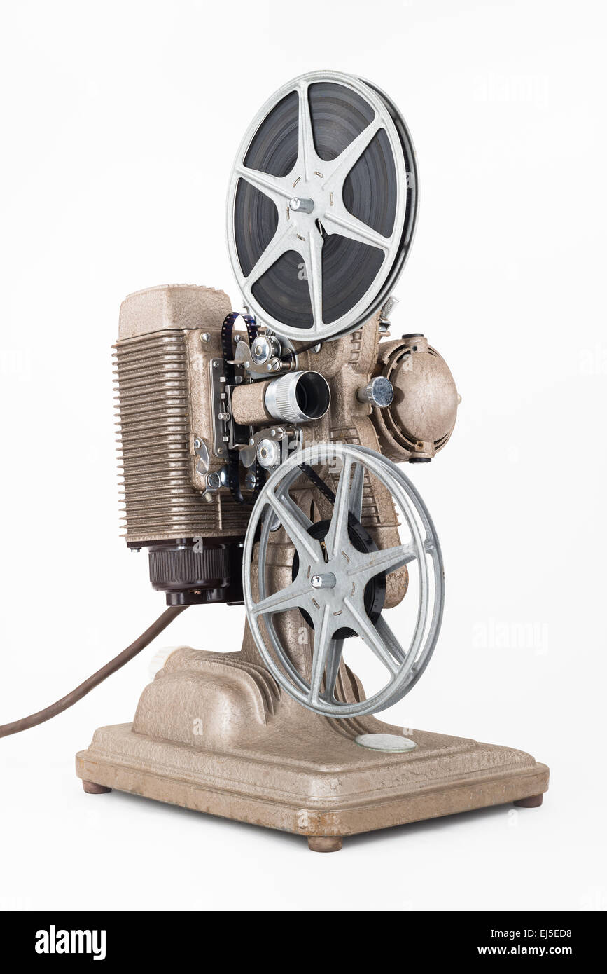 Angled view of Vintage 8 mm Movie Projector with Film Reels. Film is
