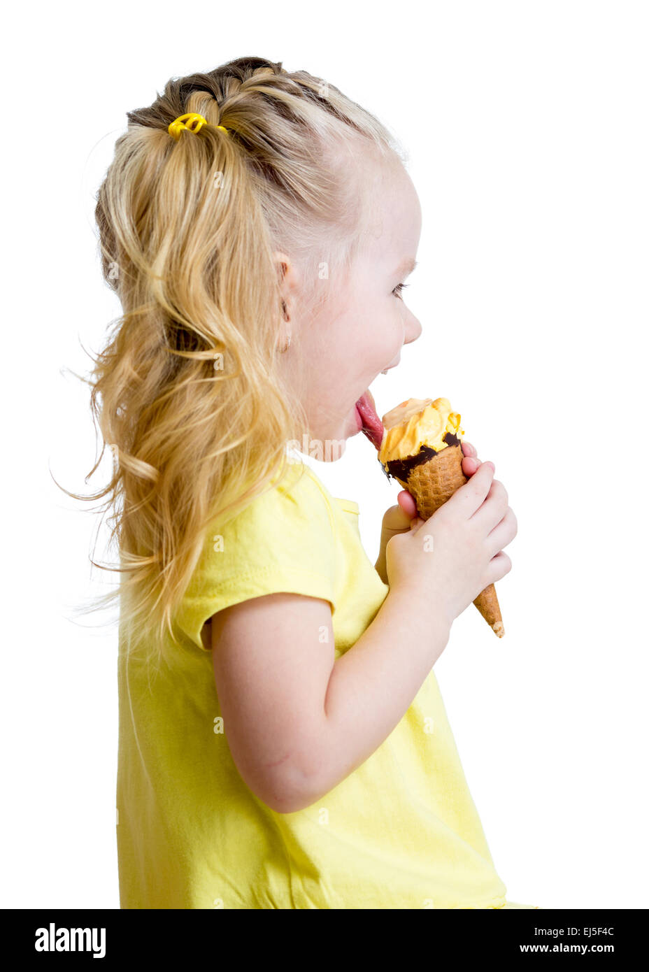 side of kid eating ice cream Stock Photo