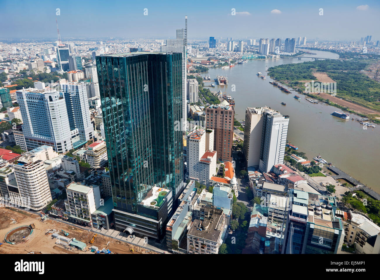 Aerial view of the city and Saigon River from Bitexco Financial Tower Observation Deck. District 1, Ho Chi Minh City, Vietnam. Stock Photo