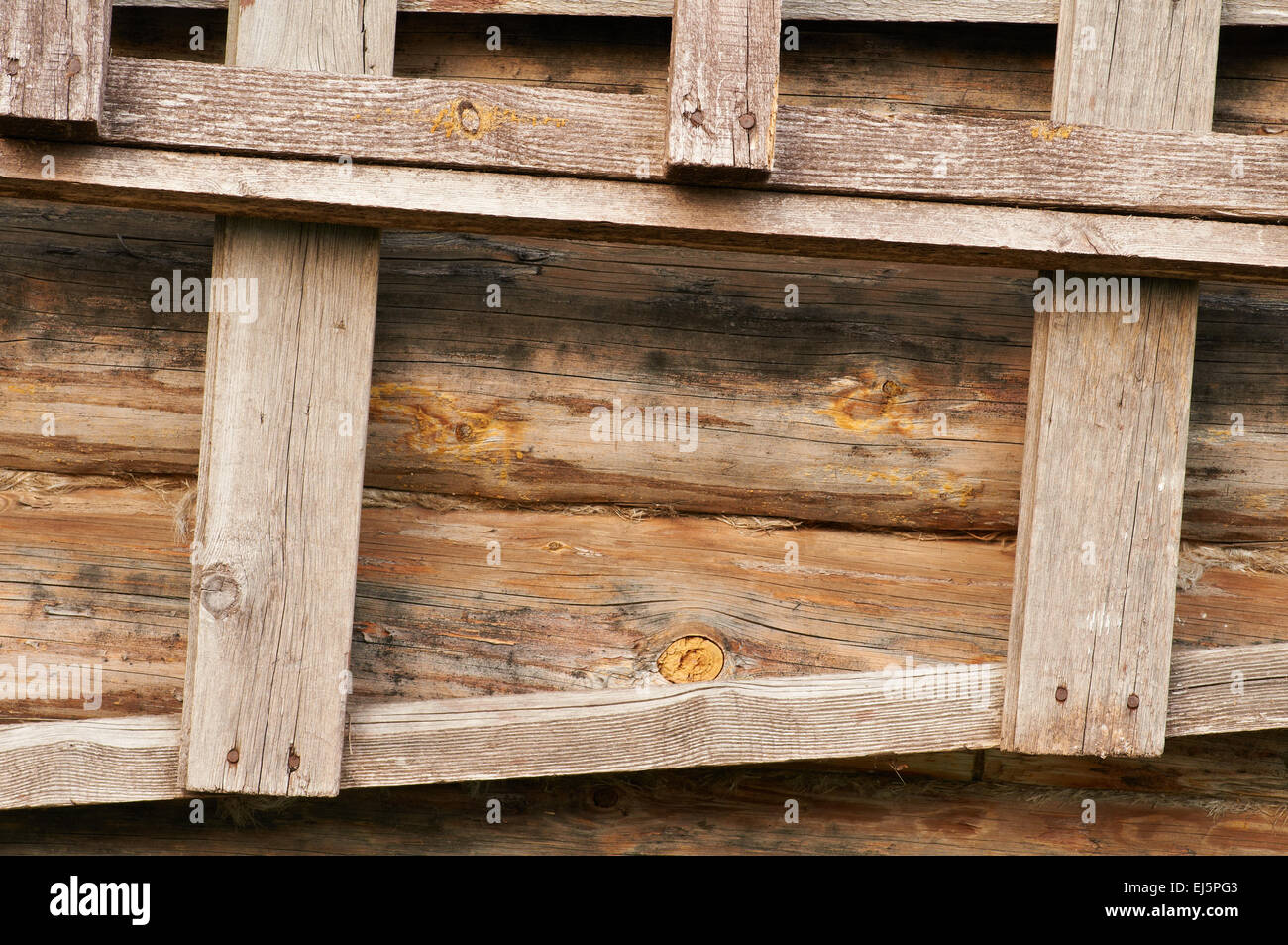 Wooden background - part of log cabin and ladder Stock Photo