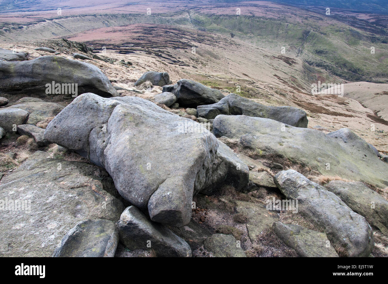 Landscape at Higher Shelf Stones with view over gritstone rocks to an expanse of moorland. Stock Photo