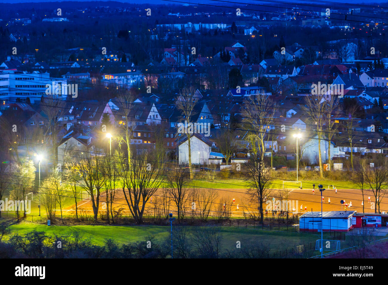 Local sports ground, illuminated in the evening Stock Photo