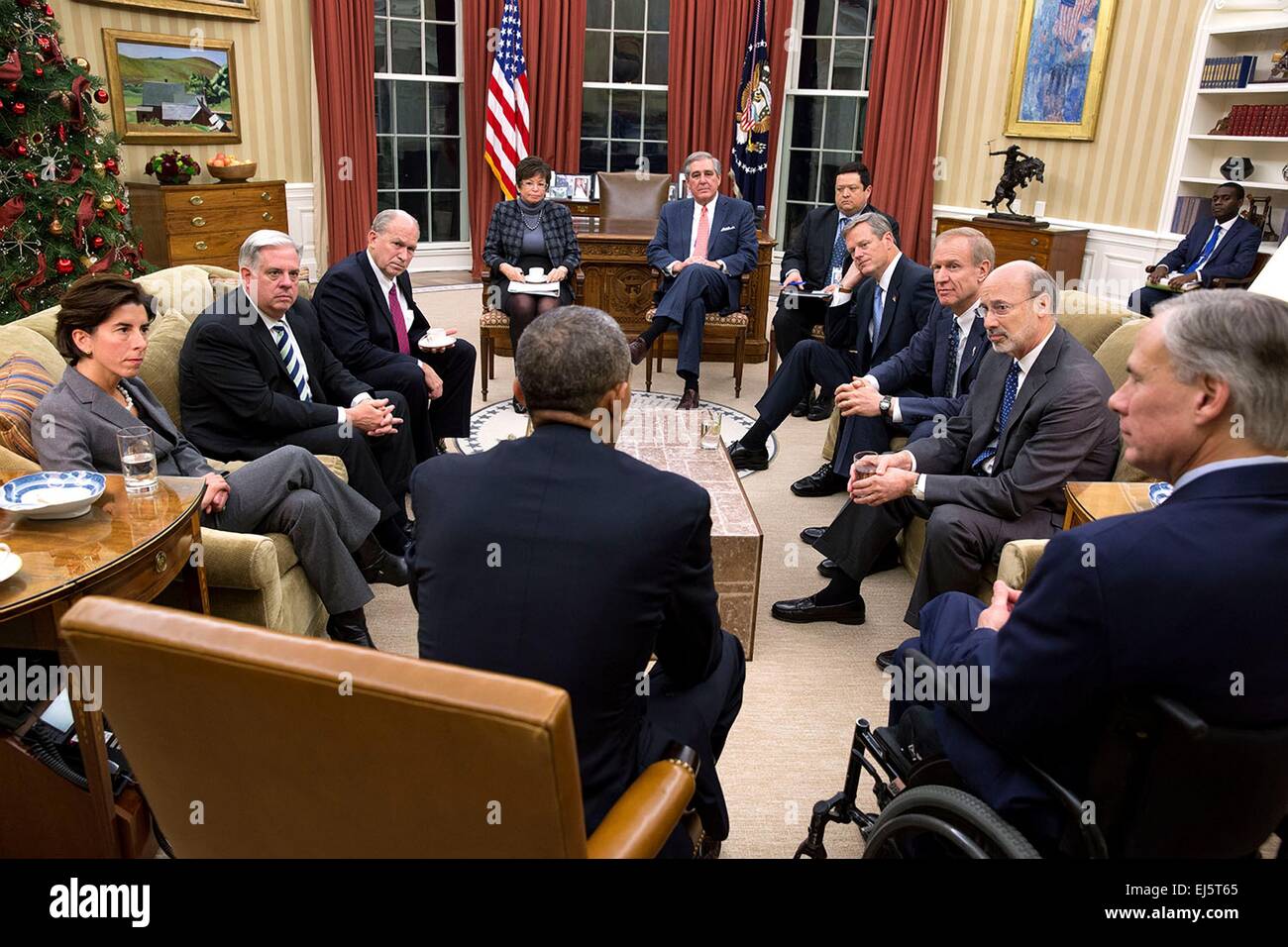 US President Barack Obama meets with newly elected governors in the Oval Office of the White House December 5, 2014 in Washington, DC. From left are Rhode Island Governor Gina Raimondo, Maryland Governor Larry Hogan, Alaska Governor Bill Walker, Senior Advisor Valerie Jarrett, Jerry Abramson, Director of Intergovernmental Affairs, Adrian Saenz, Deputy Director of Intergovernmental Affairs, Massachusetts Governor Charlie Baker, Illinois Governor Bruce Rauner, Pennsylvania Governor Tom Wolf and Texas Governor Greg Abbott. Stock Photo