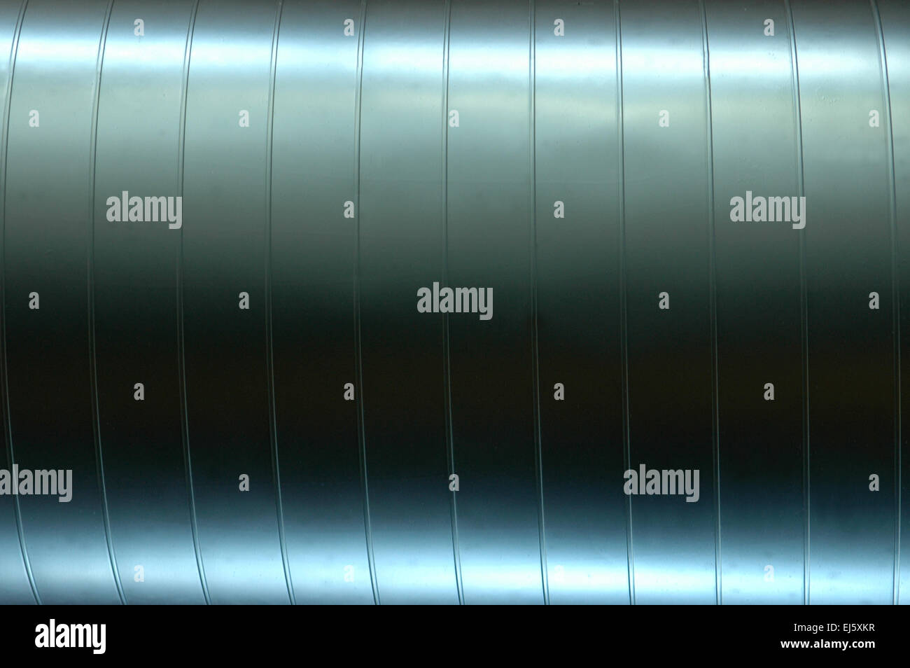 Abstract Background Texture Of A Shiny Industrial Pipe Stock Photo
