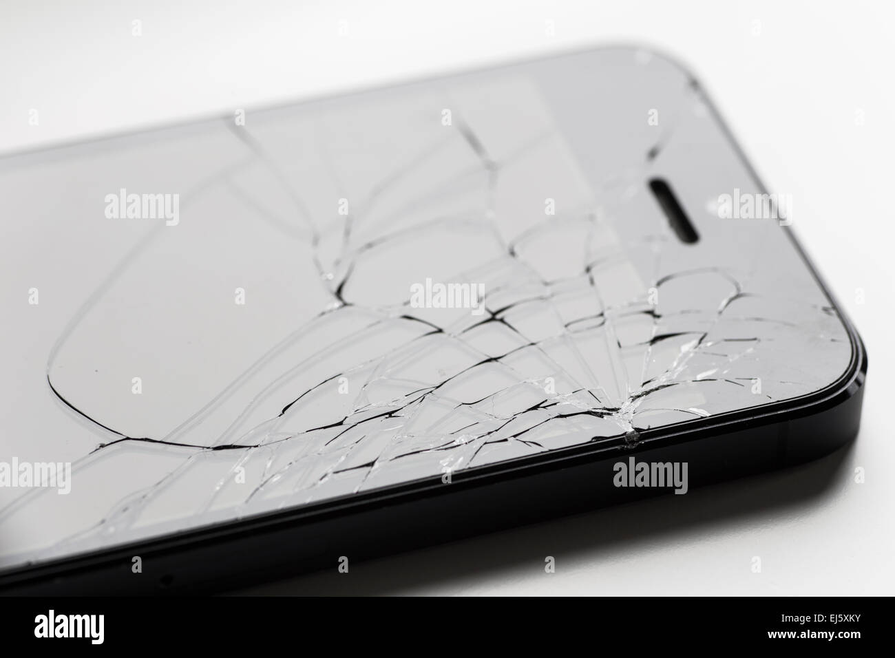 Broken Apple iPhone 5 screen. Stock Photo