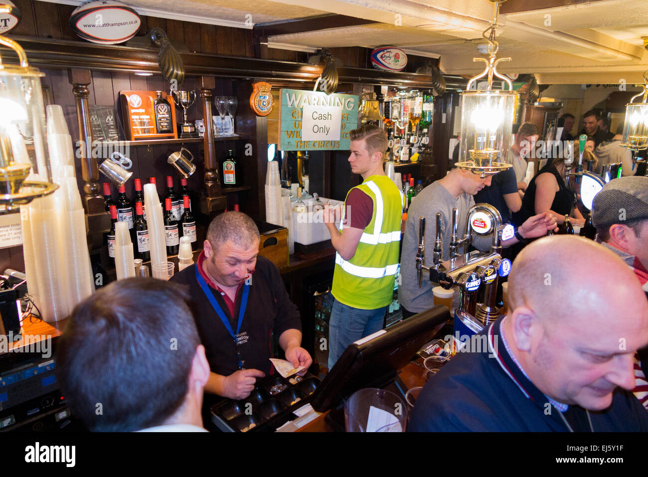 Rugby fan crowd / fans at crowded busy bar The Barmy Arms pub