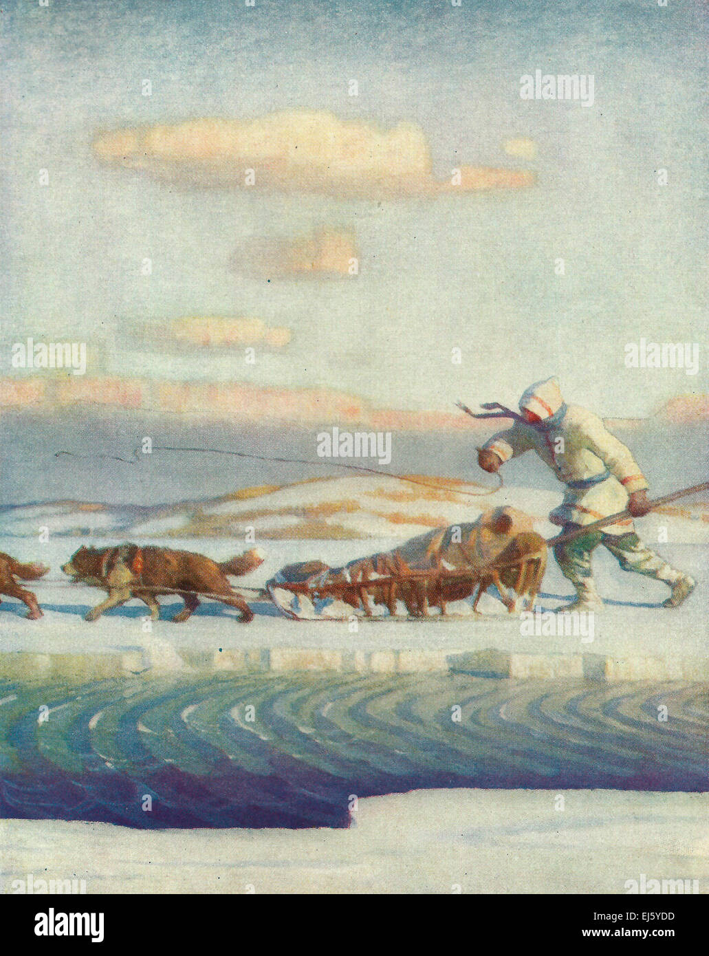 One January afternoon at dusk, the Matagami winter mail jingled up to the trade houses   N C Wyeth Stock Photo
