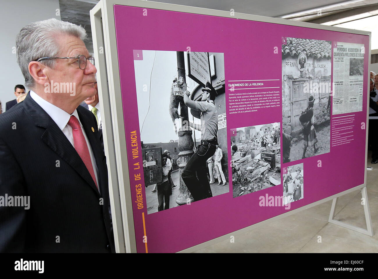 Lima, Peru. 21st Mar, 2015. German President Joachim Gauck visits an exhibition on the time of the armed, internal conflict in Peru in the 'Lugar de la Memoria' museum in Lima, Peru, 21 March 2015. The German president is on a multi-day visit to South America. Photo: WOLFGANG KUMM/dpa/Alamy Live News Stock Photo
