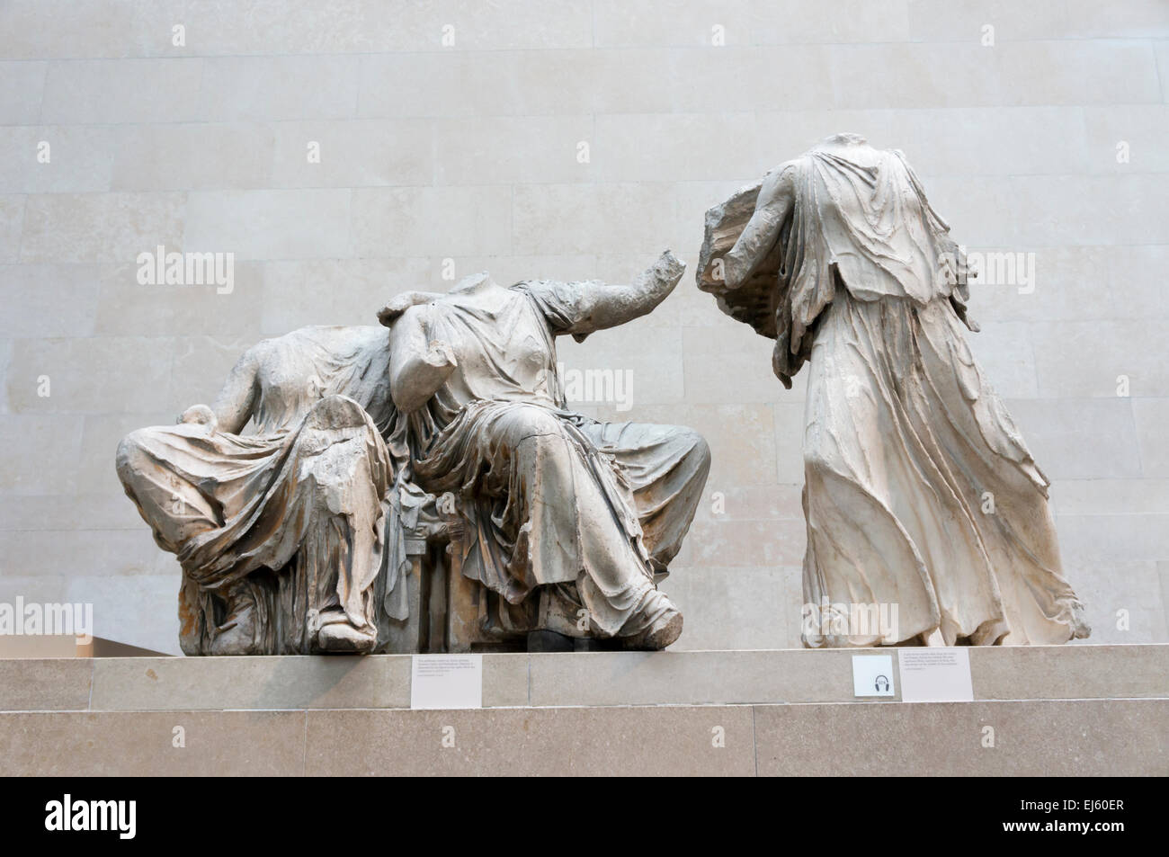 The Elgin Marbles. Sculpture from the Parthenon.  The two figures to the left are goddesses, possibly Demeter and Persephone. Stock Photo