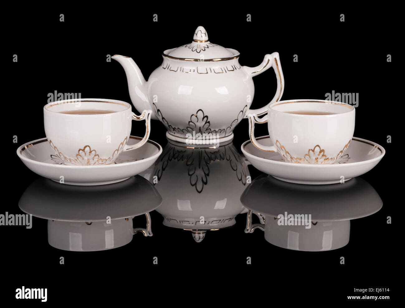 White porcelain tea set on black reflecting background Stock Photo Alamy