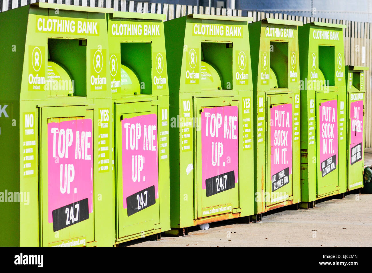 Row of Oxfam clothing collection containersur Stock Photo