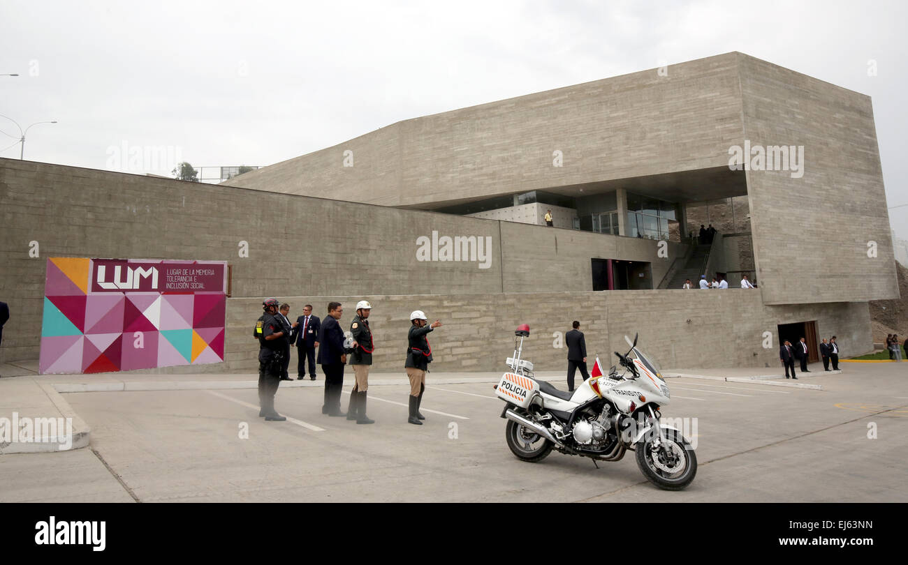 Lima, Peru. 21st Mar, 2015. Police officers secure the 'Lugar de la Memoria' museum before a visit from German President Joachim Gauck in Lima, Peru, 21 March 2015. The German president is on a multi-day visit to South America. Photo: WOLFGANG KUMM/dpa/Alamy Live News Stock Photo