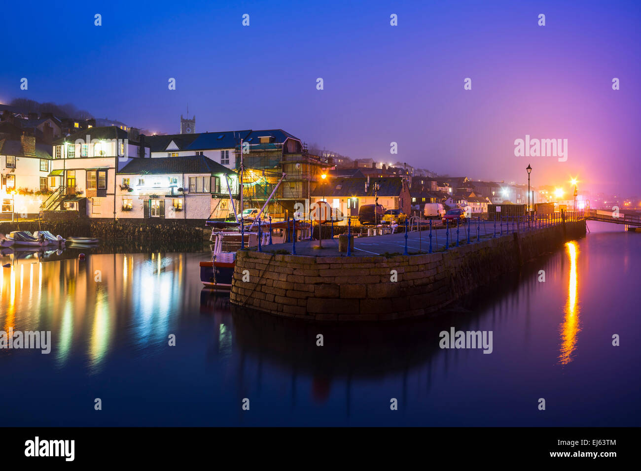 Custom House quay harbour Falmouth at Dusk on a foggy evening. Cornwall England UK Europe Stock Photo