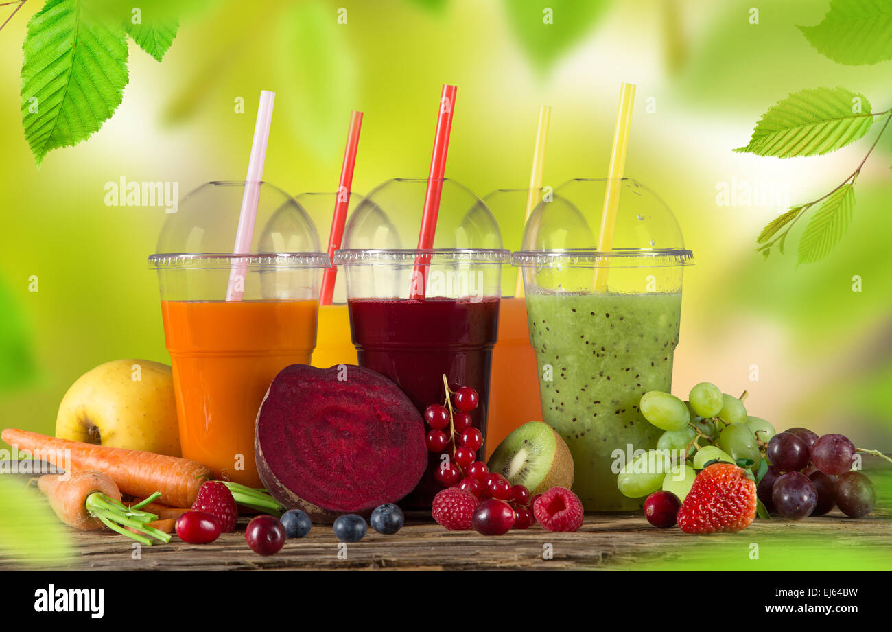 Fresh juice mix fruit, healthy drinks on wooden table Stock Photo Alamy