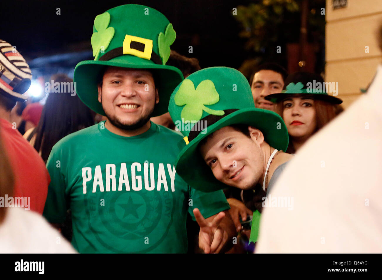 Asuncion, Paraguay. 22nd Mar, 2015. People wearing green hats celebrate