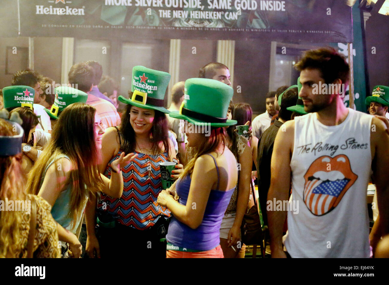 Asuncion, Paraguay. 22nd Mar, 2015. People wearing green hats celebrate