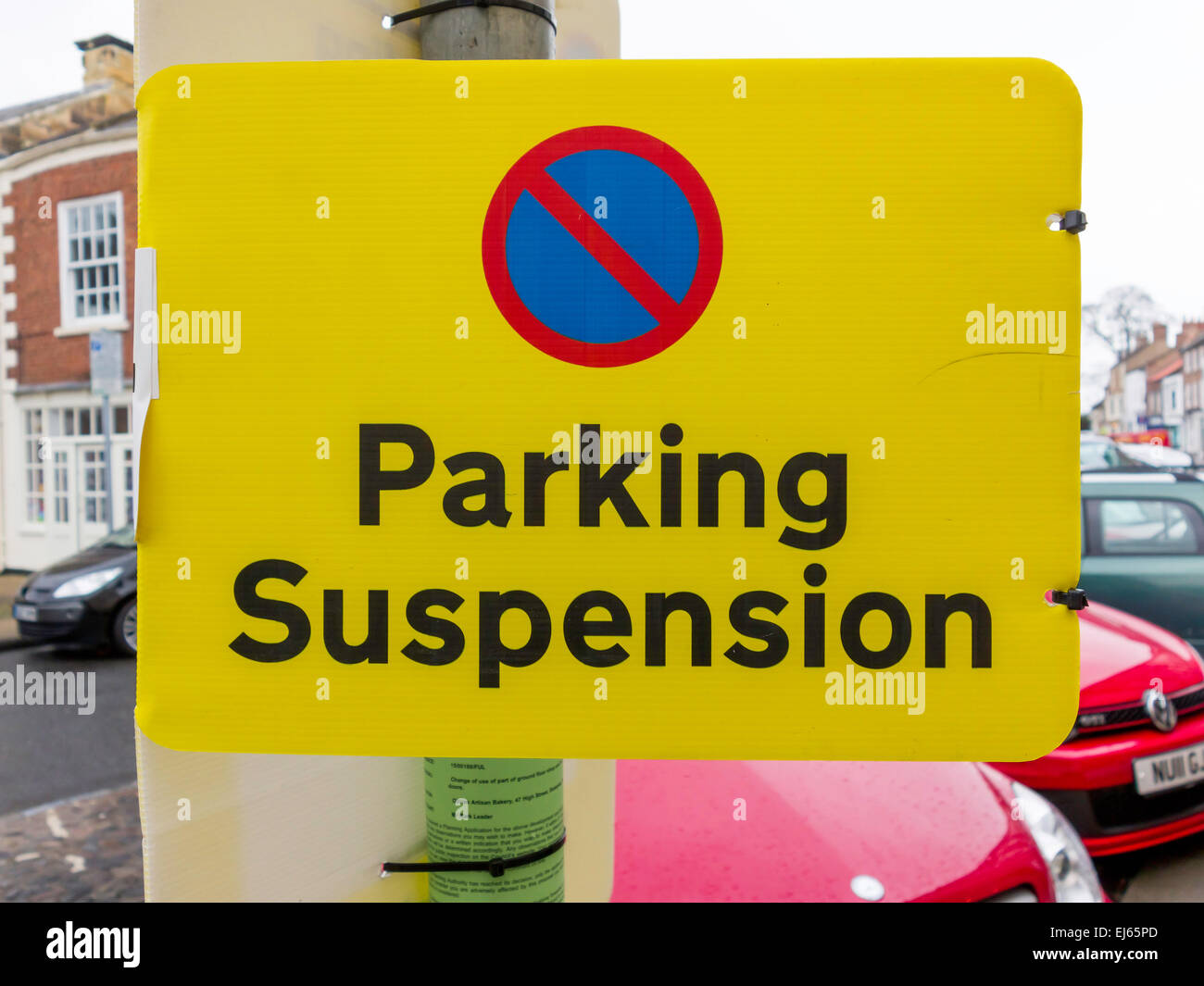 Sign reading Parking Suspension where bays are required for road repairs Stock Photo