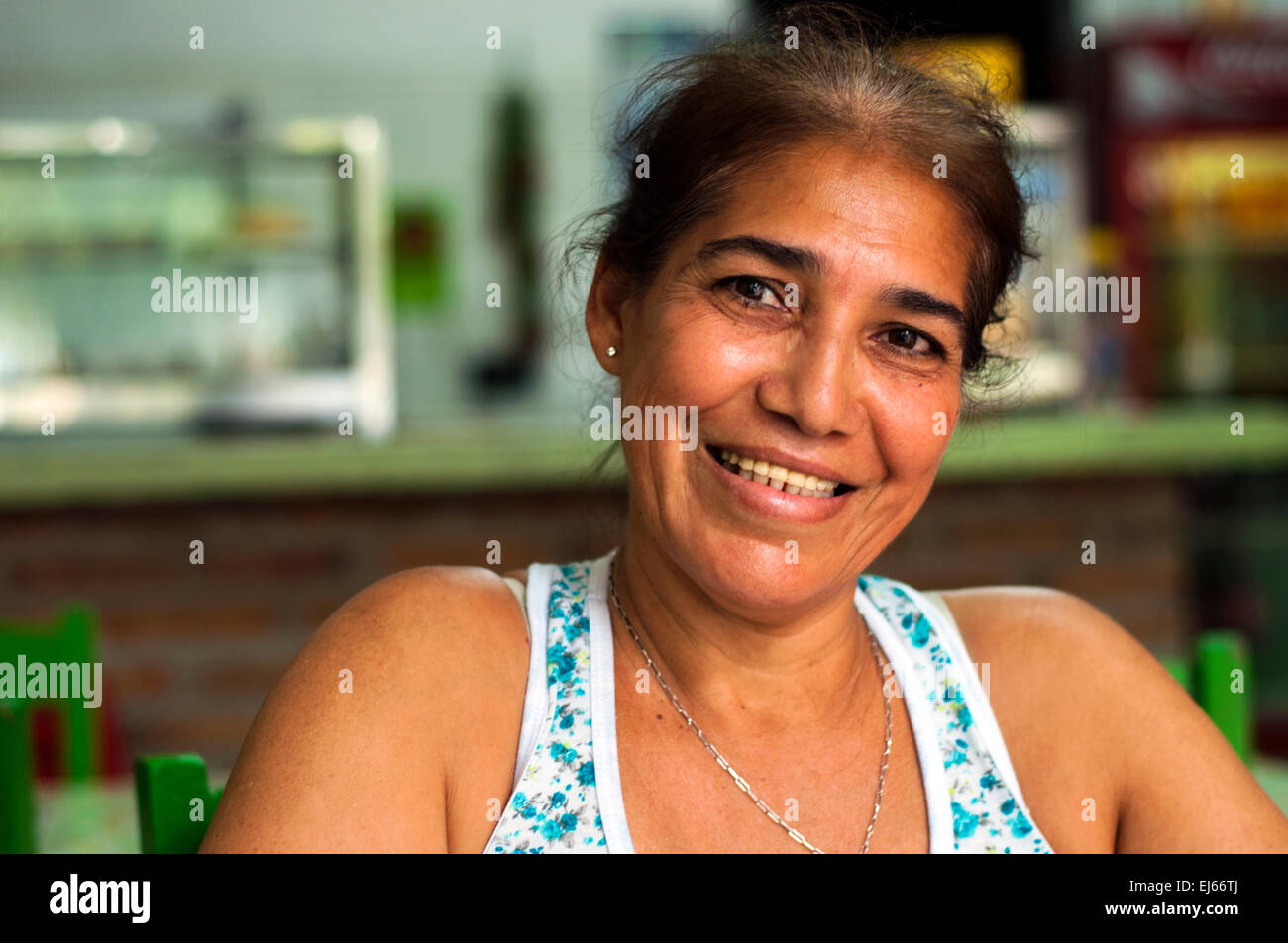 Woman in small shop, central Asuncion Stock Photo