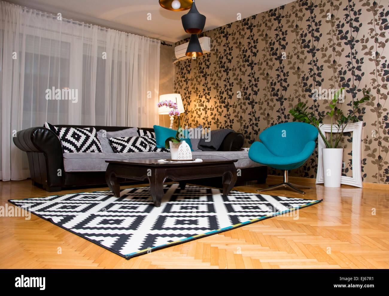 Eccentric design for living room interior with blue black and white details Stock Photo